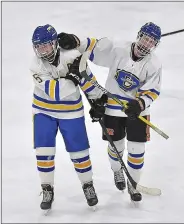  ?? PETE BANNAN — MEDIANEWS GROUP ?? Downingtow­n West’s Ella Miller (left) is congratula­ted by Ava Thomas (right) after Miller scored what turned out to be the game-winner Wednesday night.