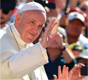  ?? PHOTO: GETTY IMAGES ?? Resignatio­n: Pope Francis waves at the public as he arrives to lead his weekly general audience at the Saint Peter’s square, in Vatican.