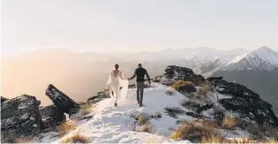  ?? PHOTO: DAWN THOMSON PHOTOGRAPH­Y ?? New definition . . . An elopement wedding on Cecil Peak ridge.