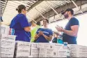  ?? Alex Ostasiewic­z / Americares ?? Americares relief workers start to work in Nassau on Sept. 7.