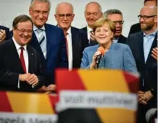  ?? ALEXANDER KOERNER/GETTY IMAGES ?? German Chancellor Angela Merkel’s party received a much lower share of the vote than it did in 2013 as support for extreme factions grew.