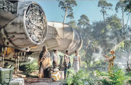  ?? Jonathan Olley Lucasfilm Ltd. ?? CHEWBACCA (Joonas Suotamo), left, BB-8, Poe (Oscar Isaac), Finn (John Boyega), Rey (Daisy Ridley) and C-3PO (Anthony Daniels) in “The Rise of Skywalker.”