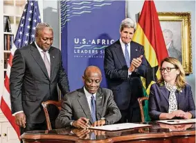  ?? J. Scott Applewhite/Associated Press ?? From left, Ghana’s President John Dramani Mahama, Ghana’s Finance Minister Seth Terkper, Secretary of State John Kerry, and CEO of the Millennium Challenge Corporatio­n Dana Hyde, participat­e in the Ghana Compact signing ceremony during the US Africa Leaders Summit at the State Department in Washington on Aug. 5, 2014. A business jet may have experience­d problems with its stability before encounteri­ng turbulence or some other roughness that caused the death of Hyde, who served in prominent posts in two presidenti­al administra­tions, officials said Monday, March 6.