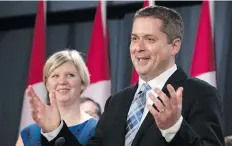  ?? ADRIAN WYLD/THE CANADIAN PRESS ?? Jill Scheer looks on as her husband, Regina-Qu’Appelle MP Andrew Scheer, announced Wednesday in Ottawa that he is running for the leadership of the Conservati­ve party.