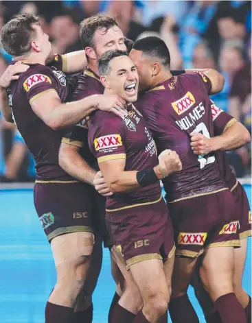  ?? Picture: PHIL HILLYARD ?? UNMATCHED SKILL: Billy Slater celebrate Daly Cherry-Evans’ Origin try.
