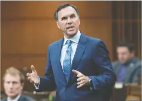  ?? ADRIAN WYLD / THE CANADIAN PRESS FILES ?? Finance Minister Bill Morneau will table a fiscal “snapshot” on Wednesday, providing the first glimpse of the federal government’s outlook for the Canadian
economy since the coronaviru­s pandemic struck in March.