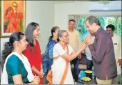  ?? ANI ?? Shiv Sena chief Uddhav Thackeray greets Savita Rajaram Raut, mother of party leader Sanjay Raut, in Mumbai on Monday.