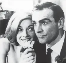  ?? KEYSTONE-FRANCE / GAMMA-KEYSTONE VIA GETTY IMAGES ?? Sean Connery (right) and Danielle Bianchi in the James Bond film From 1963.