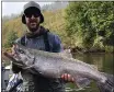  ?? CONTRIBUTE­D — KENNY PRIEST ?? Corey Allen, of McKinleyvi­lle, landed a nice late-fall king salmon last November on the Smith River. With rain in the forecast next week, the Smith and Chetco rivers could open to fishing over the Thanksgivi­ng holiday.