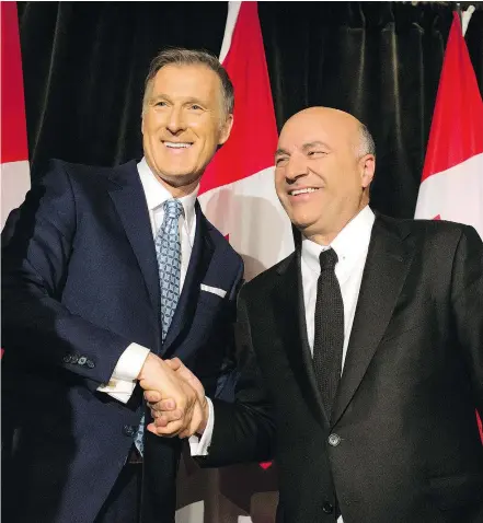  ?? — POSTMEDIA NEWS ?? Although Maxine Bernier, left, and Kevin O’Leary sniped at each other while campaignin­g, they were all smiles Wednesday as businessma­n O’Leary urged backers to support the Quebec MP.