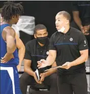  ?? Kyusung Gong Associated Press ?? CLIPPERS coach Tyronn Lue wants his players to learn about one another to help build chemistry.