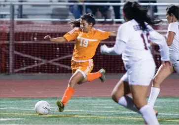  ?? RECORDER PHOTOS BY CHIEKO HARA ?? Portervill­e High School’s Vanessa Tadeo scores a goal Wednesday during the first half at Rankin Stadium. Tadeo scored the first goal for the Panthers in their 5-0 win over Granite Hills.