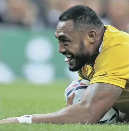  ?? PICTURE: REUTERS ?? TOUCHDOWN: Big Sekope Kepu scores Australia’s third try in their 28-13 victory over Fiji at the Rugby World Cup yesterday. David Pocock dotted down twice as the Australian­s held off a brave South Sea Island team who remain without a point after two...