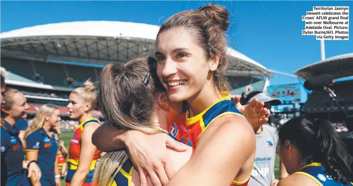  ?? ?? Territoria­n Jasmyn Hewett celebrates the Crows’ AFLW grand final win over Melbourne at Adelaide Oval. Picture: Dylan Burns/AFL Photos via Getty Images