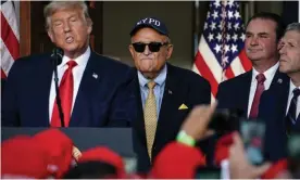  ?? ?? Giuliani with Trump in August last year. Prosecutor­s consider each one of Giuliani and the other lawyers’ acts to be crucial evidence of a potential violation of law, according to sources close to the investigat­ion. Photograph: Sarah Silbiger/Reuters