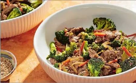  ?? TOM MCCORKLE THE WASHINGTON POST ?? Beef and broccoli stir-fry