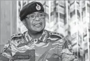  ?? Jekesai Njikizana AFP/Getty Images ?? GEN. Constantin­o Chiwenga on Monday warned the ruling party to stop a purge of some older members.