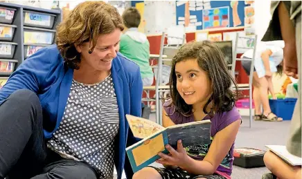  ?? LINDSAY KEATS PHOTOGRAPH­Y ?? Stacey Shortall with pupil Beaumia Lemisio at the Holy Family School’s Homework Help Club in Cannons Creek, Porirua.