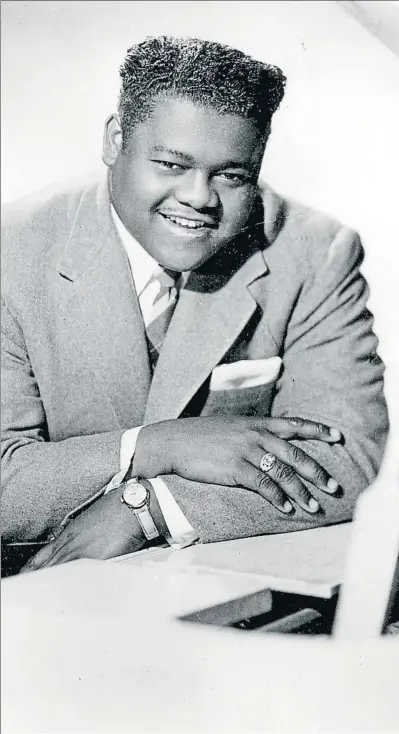  ?? AP ?? Fats Domino, al piano, en una de las imágenes más caracterís­ticas de su carrera