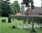  ?? AUTHOR ?? Gresley’s final resting place in Netherseal (the white, stone-covered grave in the centre), with his wife beside him, as well as his parents.