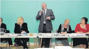  ?? CHRIS WHITEOAK ?? Councillor Nigel Manning takes to the floor at a meeting of Ash Parish Council where councillor­s and residents were discussing planning.
