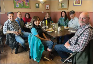  ?? Photo by Julia Lerner ?? SENATE FINANCE COMMITTEE IN NOME—Members of the Alaska Senate Finance Committee and their guests enjoyed lunch at Nome’s Polar Café before touring the NACTEC education facilities on a rainy Friday afternoon. (L-R) House District 39 Representa­tive Neal Foster, Senator Donny Olson, Olson’s wife Willow, Foster’s aunt Iris Magnell, Senator Natasha von Imhof, Darlene Bishop (wife of Senator Click Bishop), Senator Click Bishop and Senator Bert Stedman.