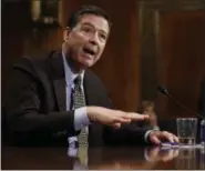  ?? CAROLYN KASTER — THE ASSOCIATED PRESS FILE ?? In this file photo, then-FBI Director James Comey testifies on Capitol Hill in Washington. Comey, ousted last month amid a federal investigat­ion into connection­s between Russia and the Trump campaign, is set to testify before Congress next week in a...