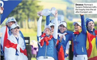  ??  ?? Drama Norway’s Suzann Pettersen lofts the trophy into the air after Europe’s win