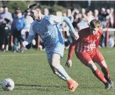  ??  ?? Ryhope CW (red) take on South Shields last weekend