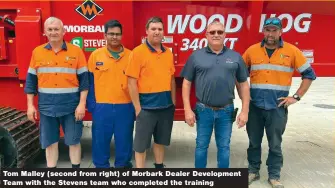  ?? ?? Tom Malley (second from right) of Morbark Dealer Developmen­t Team with the Stevens team who completed the training