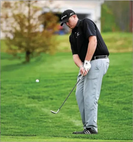  ?? PETE BANNAN — DIGITAL FIRST MEDIA ?? Above, Kennett’s Evan Brown chips onto a green during Tuesday’s Ches-Mont League Championsh­ips at Applecross Country Club. Brown finished with an even-par round of 72 for first place. Below, at top, Bishop Shanahan’s Ryan Conners pumps his fist after...