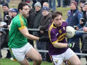  ??  ?? Left corner-forward John Tubritt racing away from Meath’s Thomas McGovern.