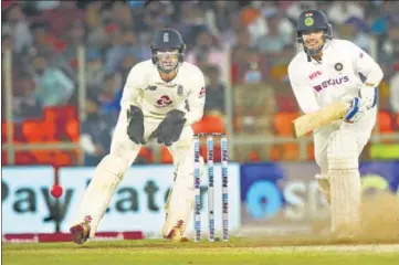  ?? BCCI ?? A puff of dust rises as Shubman Gill plays one through the covers during India’s second innings on Day 2 of the third Test in Ahmedabad on Thursday.