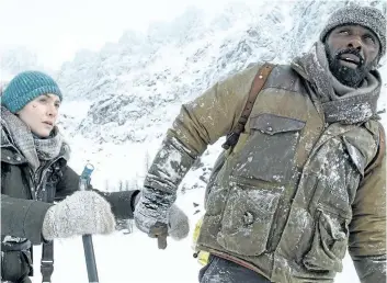  ?? HANDOUT PHOTO ?? Kate Winslet and Idris Elba in The Mountain Between Us