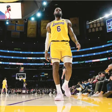  ?? MARK J. TERRILL/AP ?? Lakers forward LeBron James will play in his 19th All-Star Game on Sunday. The NBA’s leading scorer will try to go 6-0 as a captain when he faces a team drafted by Giannis Antetokoun­mpo.