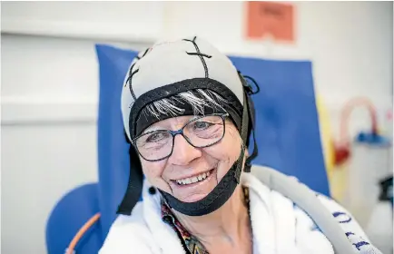  ?? BRADEN FASTIER ?? Cancer patient Claire Gaze has chemothera­py and scalp cooling treatment at Nelson Hospital.