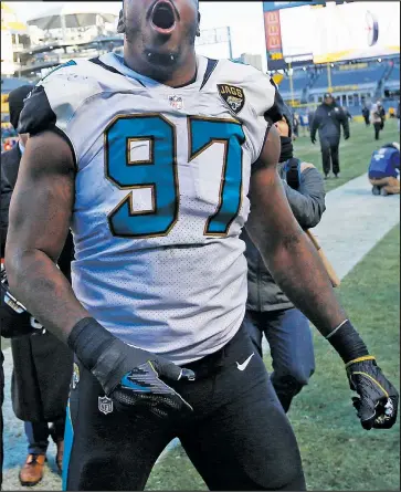  ?? AP ?? Jacksonvil­le Jaguars defensive tackle Malik Jackson celebrates as he leaves the Heinz Field playing surface after a 45-42 win over the Pittsburgh Steelers on Sunday.
