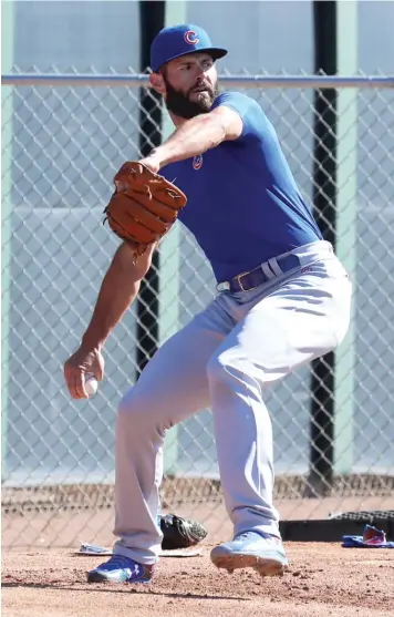  ?? JOHN ANTONOFF/SUN-TIMES ?? Jake Arrieta gave up a single and a walk but then retired six consecutiv­e batters.