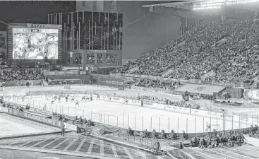  ?? Jana Chytilova / Getty Images ?? The Montreal Canadiens and the Ottawa Senators took to the outdoor ice in the NHL 100 Classic at Lansdowne Park in Ottawa, Ontario, on Saturday night. The Senators won 3-0 before a crowd of 33,959.