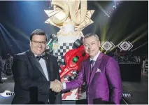  ?? OCTANE RACING ?? SHAKING THINGS UP FOR F1GP50: Mayor Denis Coderre and Octane Racing Group chief/F1 Grand Prix CEO François Dumontier mark the 50th milestone at the official F1 GP benefit event kickoff, Le Grand Soir.