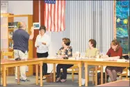  ?? Leslie Hutchison / Hearst Connecticu­t Media ?? Gary Eucalitto is sworn in as a nominated Democratic member of the Board of Education on Wednesday.