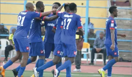  ??  ?? Rivers United players celebratin­g one of the goals… yesterday