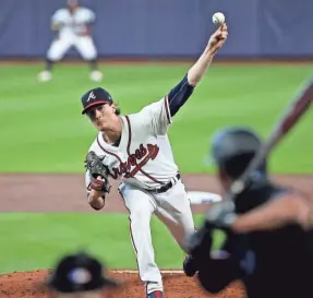  ??  ?? Braves starting pitcher Max Fried throws against the Marlins in Game 1 of their playoff series on Oct. 6 in Houston.