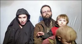  ?? YOUTUBE 2016 ?? Caitlan Coleman, her husband, Joshua Boyle, and their children are seen in this image from a 2016 Taliban video. The family was held captive for five years.