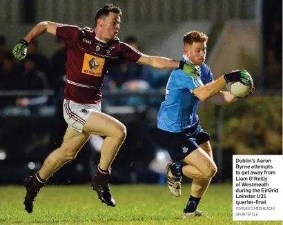  ??  ?? Dublin’s Aaron Byrne attempts to get away from Liam O’Reilly of Westmeath during the EirGrid Leinster U21 quarter-final
