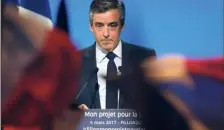  ?? (Photo AFP) ?? François Fillon tient bon, persuadé d’être, celui qui saura « casser la baraque pour la reconstrui­re » grâce à son programme « radical » de « redresseme­nt national ».