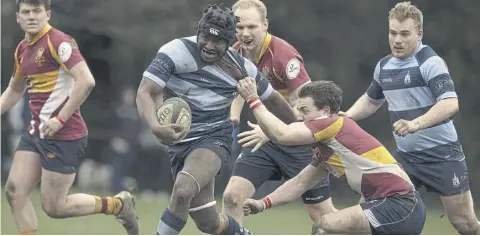  ?? ?? Chichester’s Tyrese Makasi;trys to find a way through the Dartfordia­ns defence | Picture: Chris Hatton