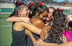  ?? Alexandra Wimley/Post-Gazette ?? The Sewickley Academy girls tennis team celebrated its victory against Knoch in the WPIAL Class 2A championsh­ip, and is hoping for another celebratio­n with a PIAA title.