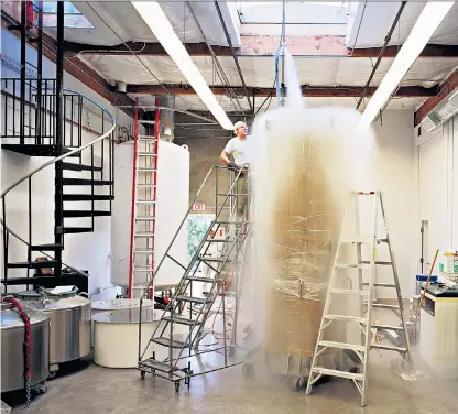  ??  ?? A container at Patient Care Bay being filled with liquid nitrogen at the Alcor Life Extension Foundation in Arizona; below, Mike Carter