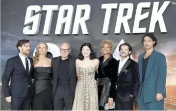  ??  ?? SIR PATRICK STEWART (3rd from left) and other cast members pose during the premiere of Star Trek: Picard in London on Jan. 15.